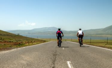 Cycling along the Paravani lake on our Bike tour Georgia from Tbilisi to Batumi