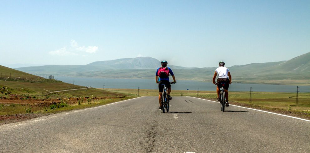 Cycling along the Paravani lake on our Bike tour Georgia from Tbilisi to Batumi