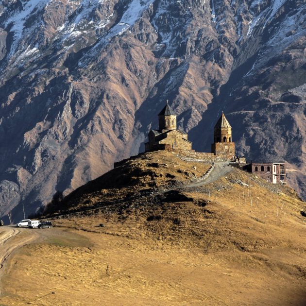 View to Gergeti Church at the foothills of Mount Kazbek